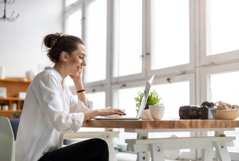 Woman working at a laptop
